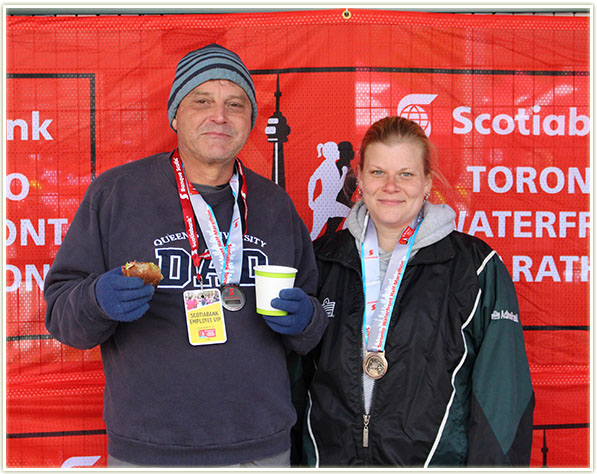 We're looking a bit dopey, but this is me and my dad after we'd finished the half!