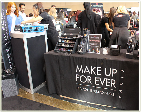 Make Up For Ever booth. BTW, if that's you with the flaming orange hair in the top left corner of this shot... your hair is AMAZING!